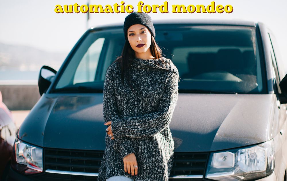A silver Ford Mondeo automatic saloon driving down an open highway