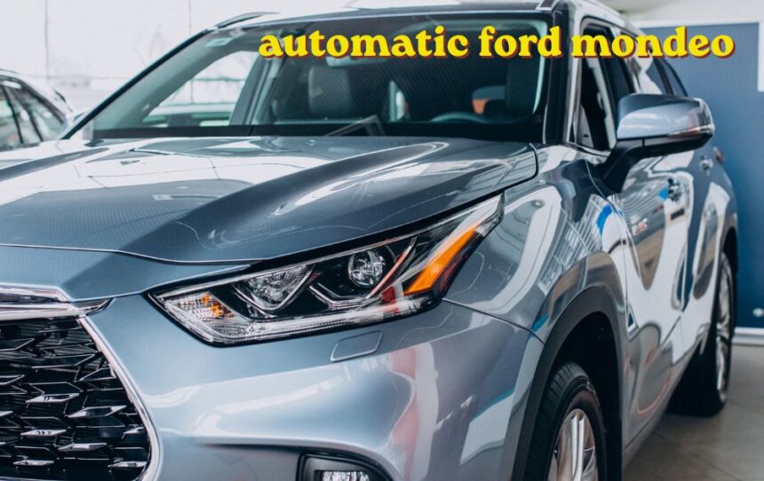 Silver automatic Ford Mondeo saloon driving smoothly down an open highway