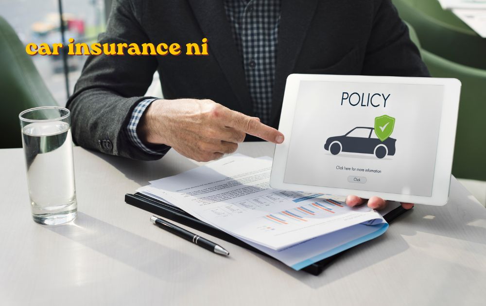 Driver comparing car insurance ni quotes on a laptop with a car parked in the background