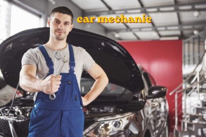 Car mechanic inspecting an engine inside a repair garage