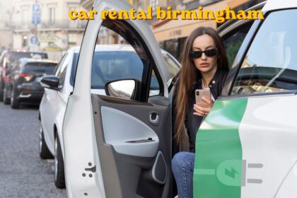car rental birmingham vehicle parked near Birmingham city skyline