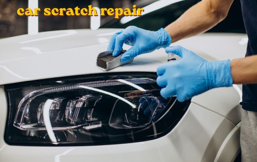 Car scratch repair being done on a vehicle door panel with touch-up paint