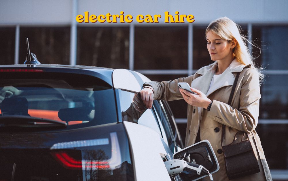 Electric car hire vehicle charging at a UK charging station