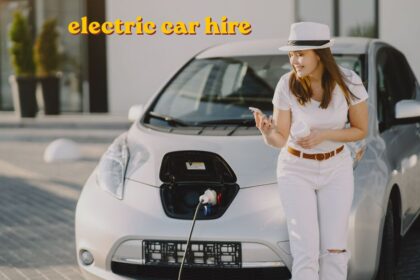 Electric car hire vehicle charging at a UK charging station