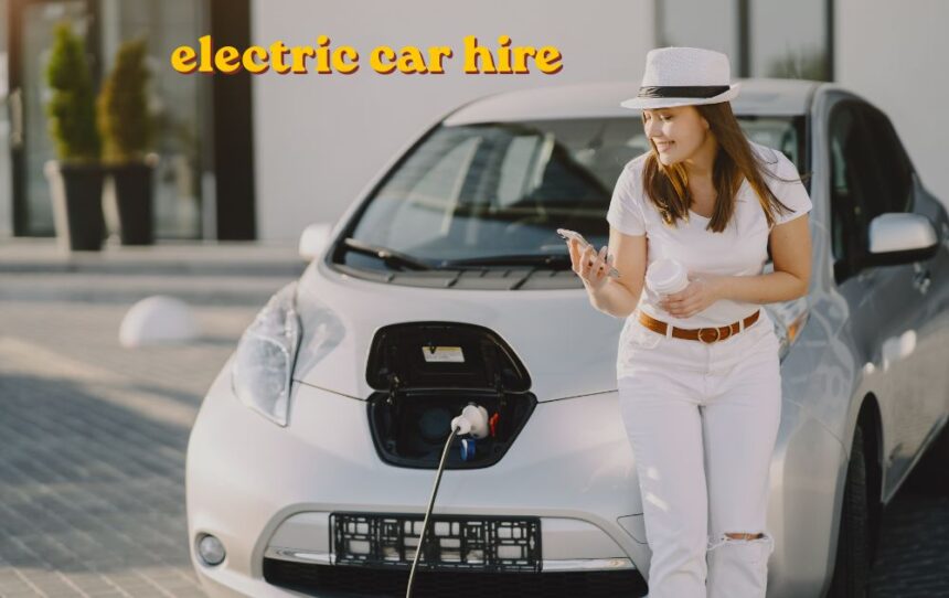 Electric car hire vehicle charging at a UK charging station
