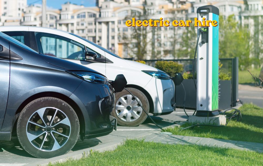 Electric car hire vehicle charging at a UK charging station
