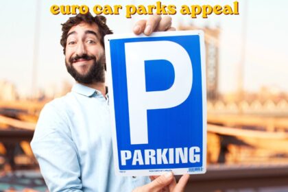 Driver reviewing a euro car parks appeal letter beside a parked car