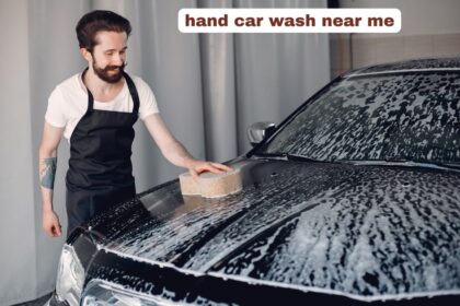 Professional hand car wash near me detailing a vehicle exterior with soapy foam.