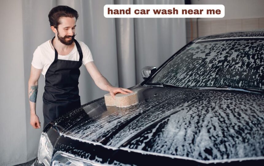 Professional hand car wash near me detailing a vehicle exterior with soapy foam.