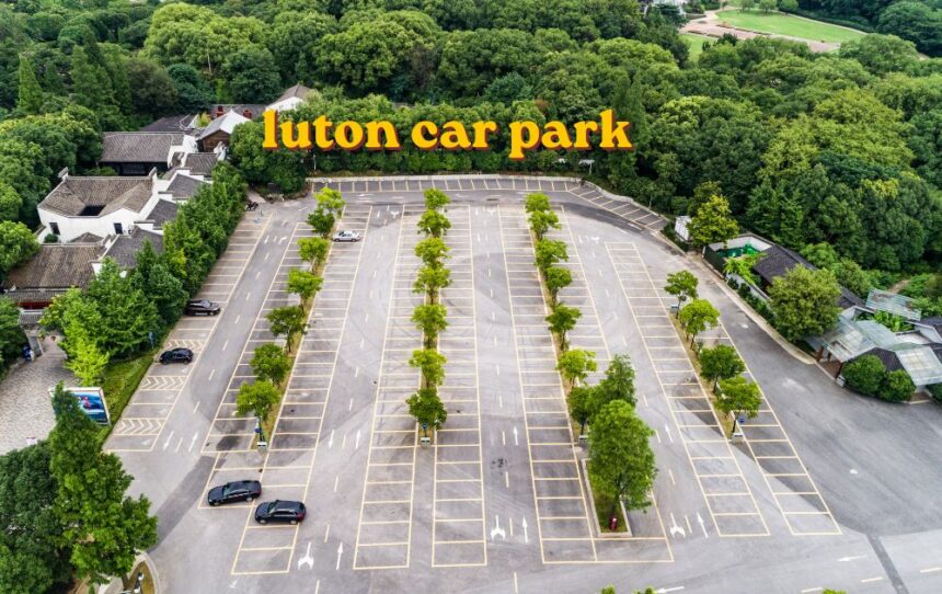 Rows of parked vehicles at a Luton car park near the airport terminal