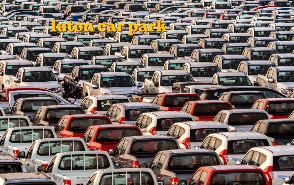 Rows of parked vehicles at a Luton car park near the airport terminal