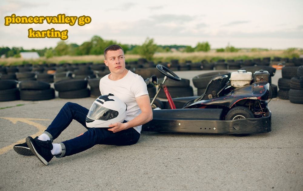 Racers speeding on the track at Pioneer Valley Go Karting