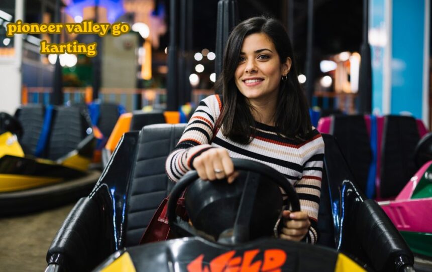 Racers speeding on the track at Pioneer Valley Go Karting