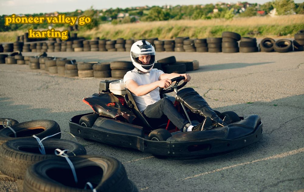 Racers speeding on the track at Pioneer Valley Go Karting