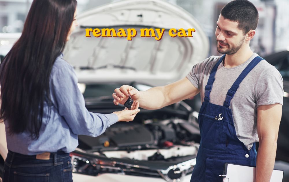 Mechanic using a laptop to remap my car through the OBD port under the dashboard