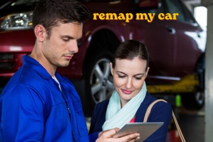 Mechanic using a laptop to remap my car through the OBD port under the dashboard