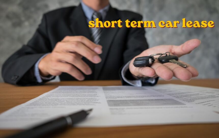 A person signing a short term car lease agreement at a dealership with a modern car in the background