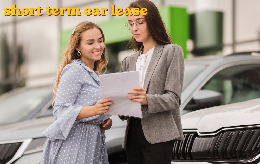 A person signing a short term car lease agreement at a dealership with a modern car in the background