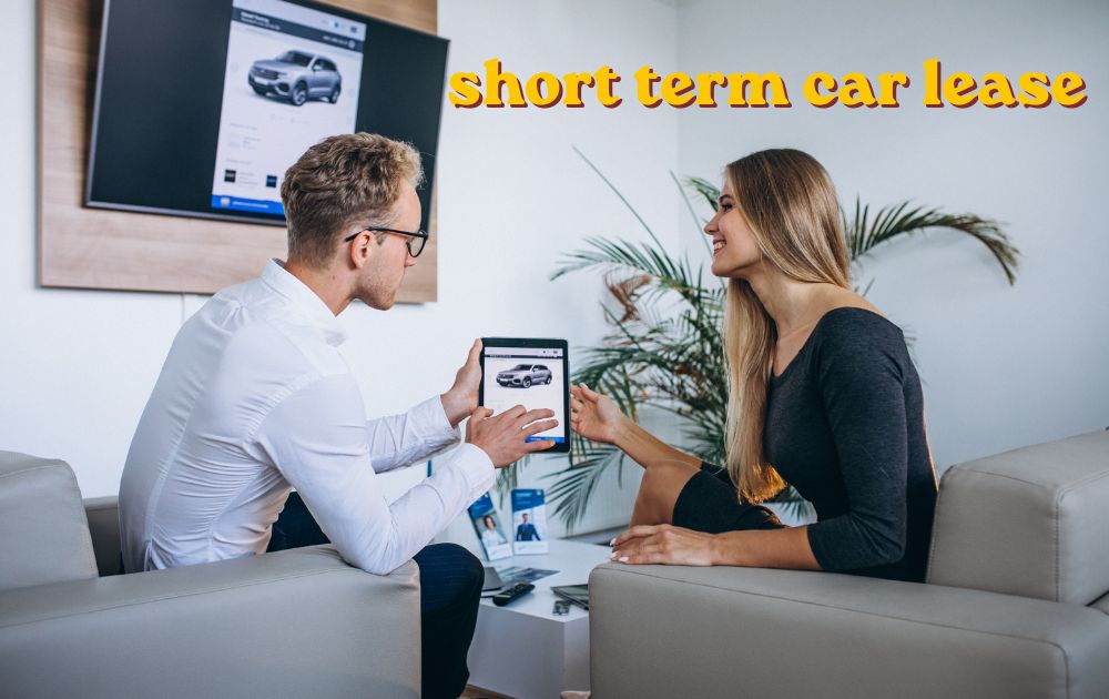 A person signing a short term car lease agreement at a dealership with a modern car in the background