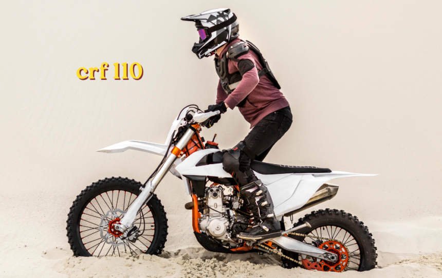 Honda CRF 110 off-road motorcycle parked on dirt trail