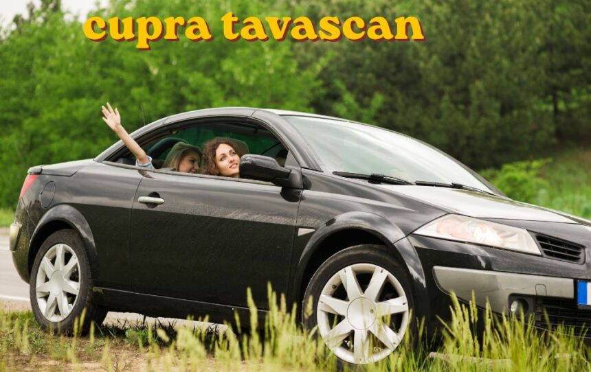 Cupra Tavascan electric SUV parked outdoors showing its sporty coupe styling and LED lighting