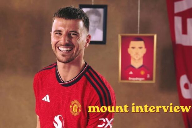 Mason Mount smiling during a mount interview in Chelsea training kit