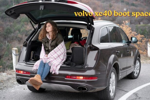 Volvo XC40 boot space open showing folded seats and luggage area