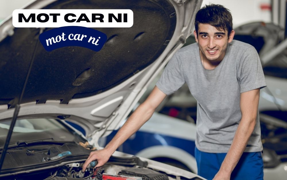 Mechanic checking car brakes during an MOT car NI test